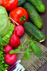 Composition with raw vegetables on sacking