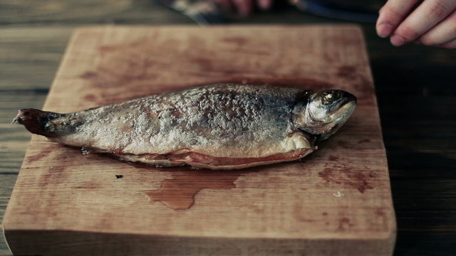 Cook cut up fried fish 001