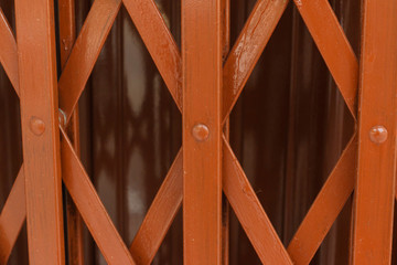 Fototapeta na wymiar red old steel door in home