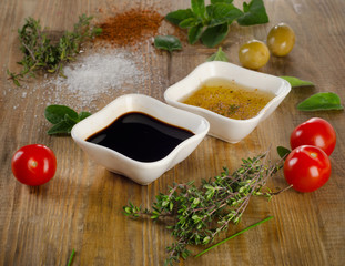 Dressing ingredients on a rustic background.