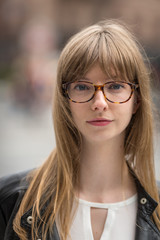 Young caucasian woman serious face portrait