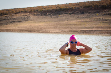 Female swimmer in a dam