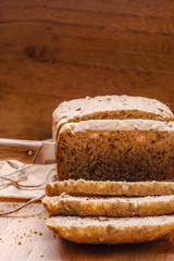 Sliced whole wheat bread on cutting board