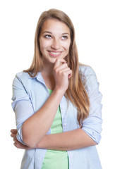 Sportliche Frau mit langen blonden Haaren tr&auml;umt