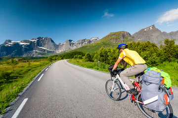 Biking in Norway against picturesque landscape