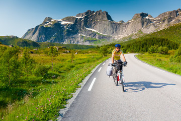 Biking in Norway against picturesque landscape
