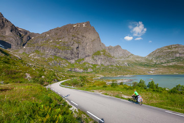 Biking in Norway against picturesque landscape