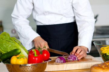 Chef chopping vegetables