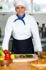 young happy man in a modern kitchen