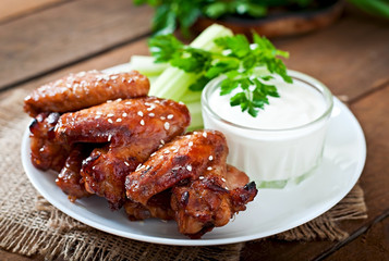 Baked chicken wings with teriyaki sauce