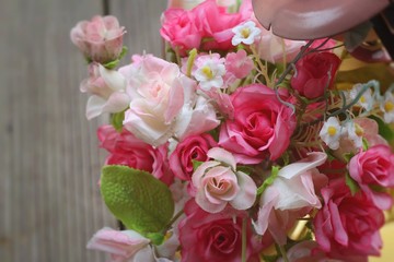 Beautiful vintage roses of artificial flowers