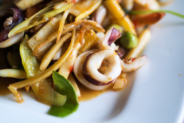 Fried spicy squid in soft light