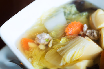Pork soup cup in soft light