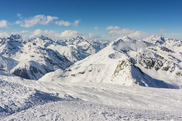 Fototapeta na wymiar Snowy top of mountains in Austria. Alps