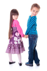 Little girl and boy looking back