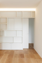 Fototapeta na wymiar Interior, white bookcase