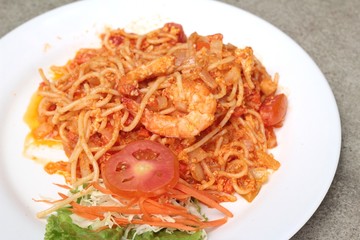 Shrimp spaghetti with sauc on dish