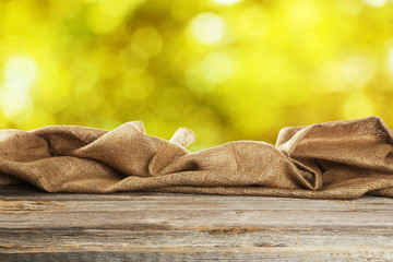 Background with wooden table with sack