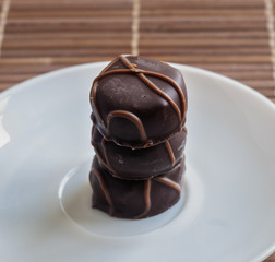 Tasty chocolate bonbon isolated on a white background