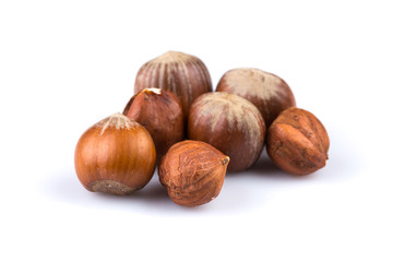 Hazelnuts on white