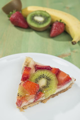 Fruit cake on green table