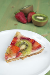 Fruit cake on green table