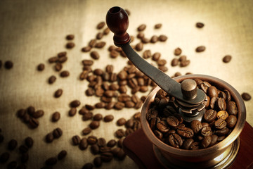 Closeup coffee bean and coffee grinder