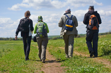 friendly tourists on a country road