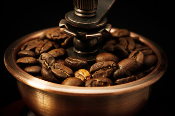 Closeup coffee bean and coffee grinder