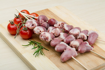 Raw chicken hearts for barbecue