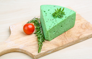 Green pesto cheese and basil leaves