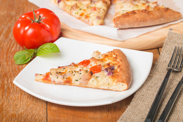 Fresh baked pizza slice