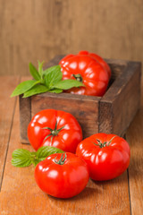 Tomatoes in wooden  box