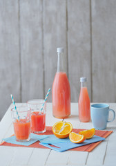 Still life with freshly squeezed grapefruit juice 