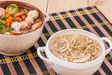 Fresh vegetable soup with sausage and chicken.