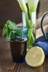 China teapot with flowers and cakes