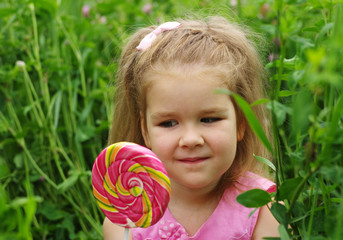  girl eating a lollipop