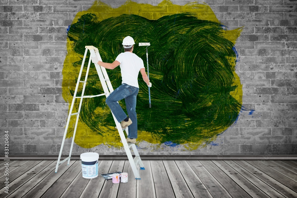 Aufkleber composite image of man on ladder painting with roller
