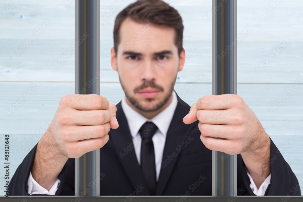 Poster Composite image of exasperated businessman with clenched fists 
