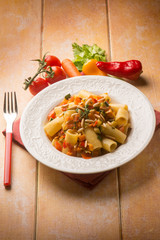 pasta with mixed vegetables and pine nuts