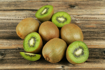 Kiwi fruit on brown wooden background