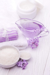 Fototapeta na wymiar sea salt and essential oils, purple lilac. spa