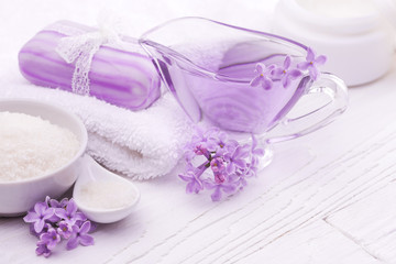 Obraz na płótnie Canvas sea salt and essential oils, purple lilac. spa