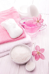 sea salt and essential oils, pink flower. spa