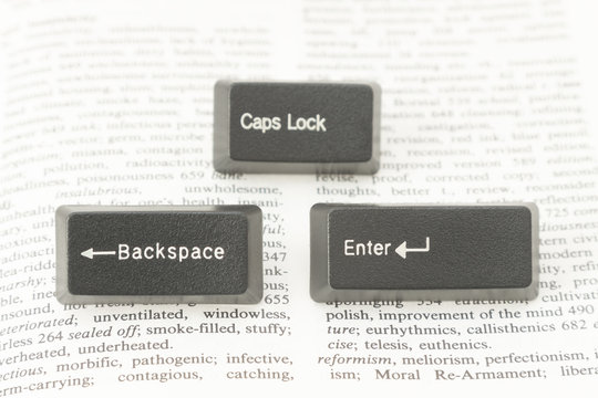 Enter CapsLock and Backspace Computer Keys on a Book Page