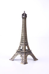 Fototapeta na wymiar Figure Tour Eiffel on a white background