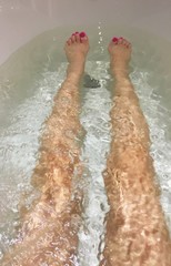 woman leg in bathtub. 