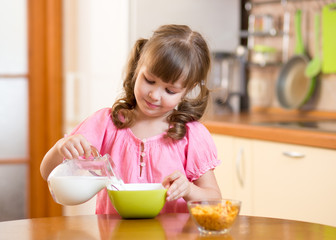 child eating healthy food at home