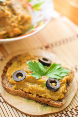 Squash caviar with olives, parsley and rye bread