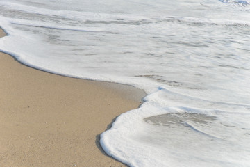 Soft wave on the tropical beach